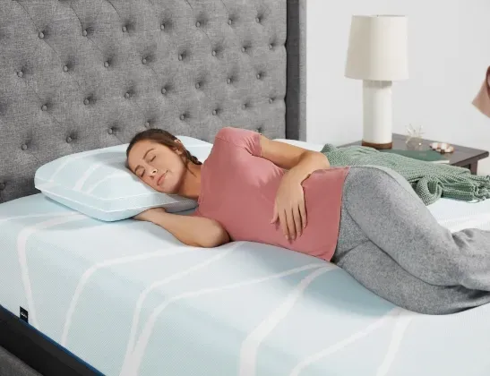 woman laying on bed